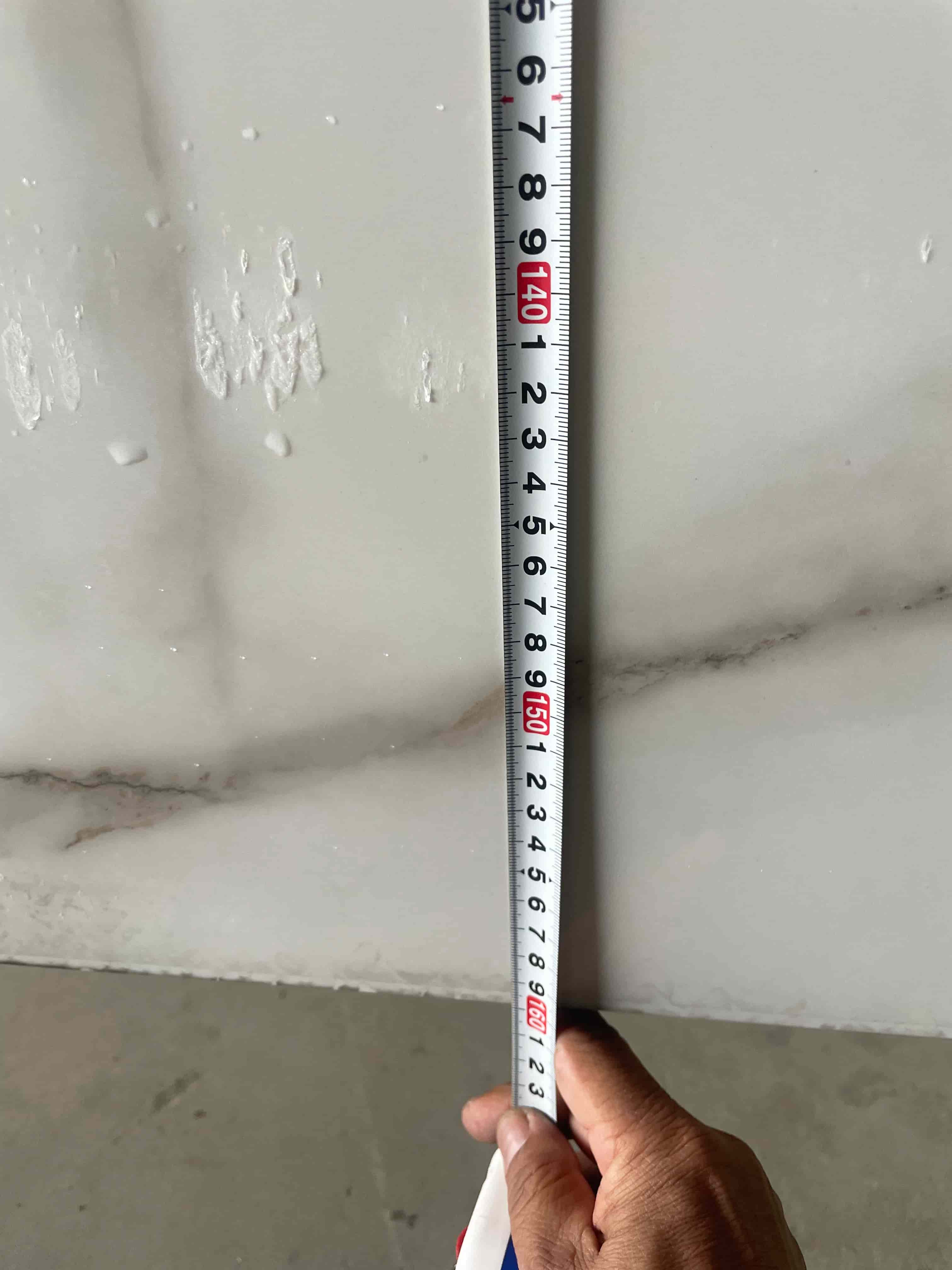 Factory measurement check for sintered stone slab before cutting