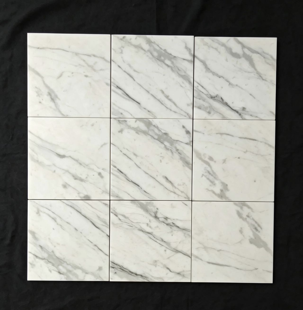 Calacatta White Continuous Vein Layout Cut-to-size Calacatta White marble tiles arranged for continuous veining